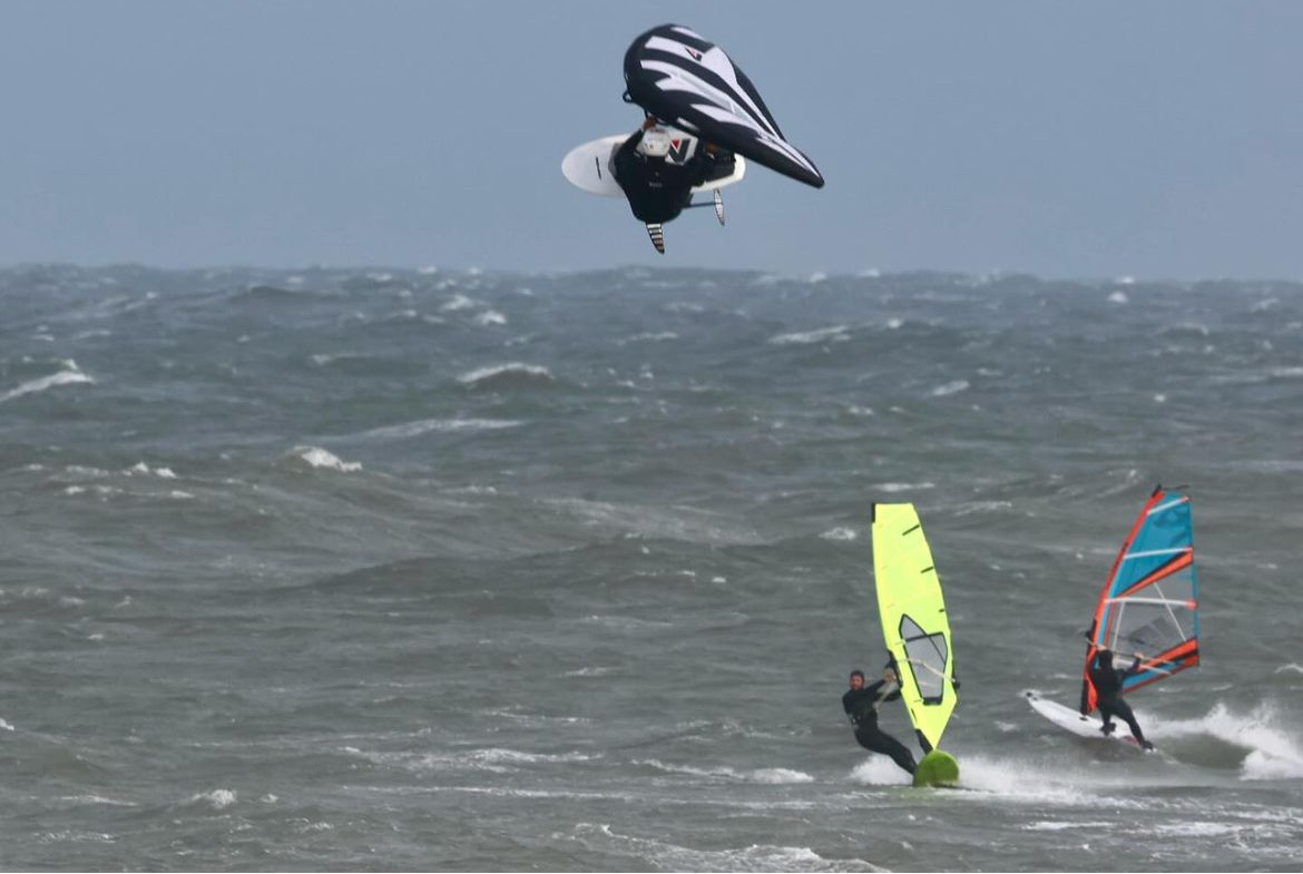 High Jump above windsurfers
